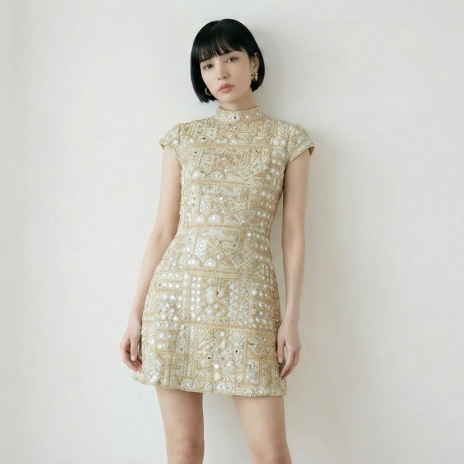 custom light gold mini dress with embroidery and faux mirror work