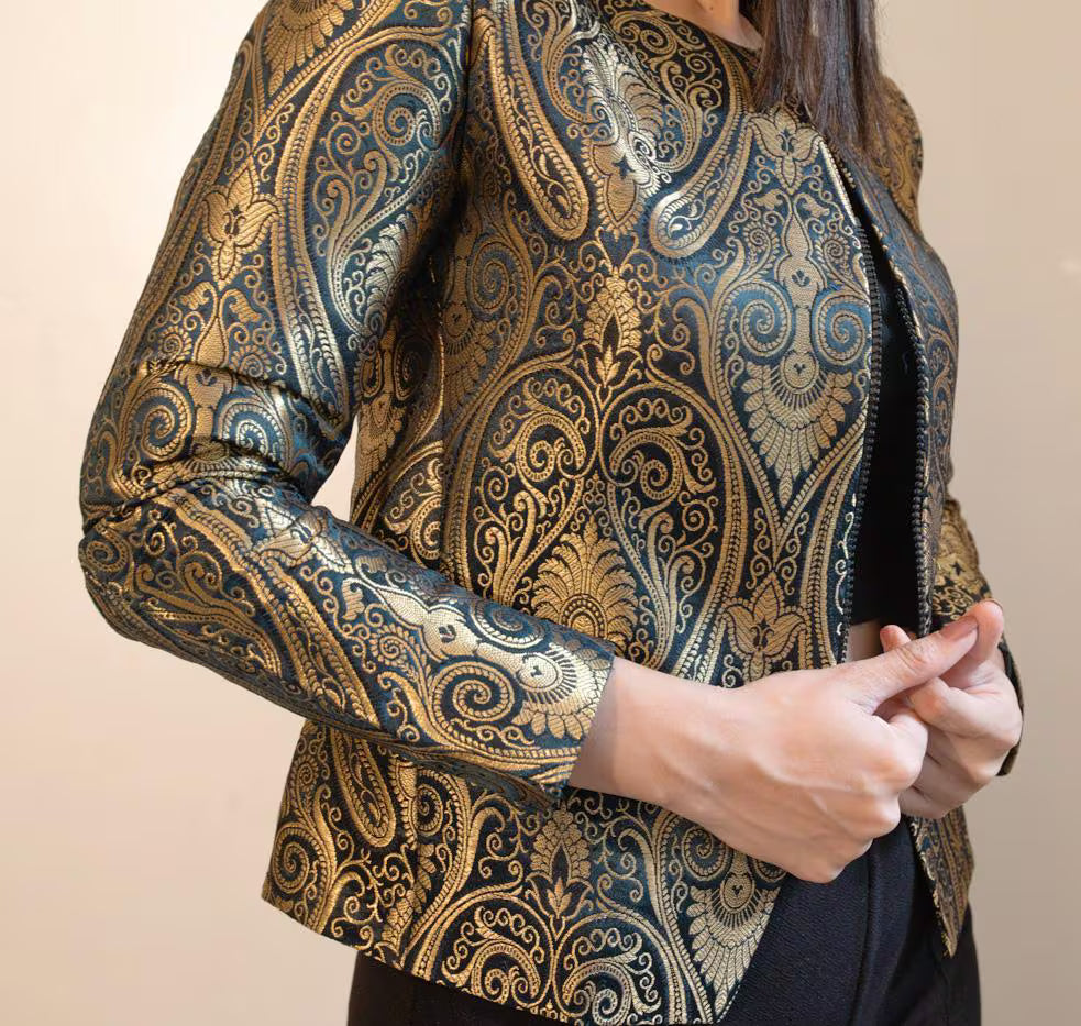 Brocade jacket in gold and black fit for a queen